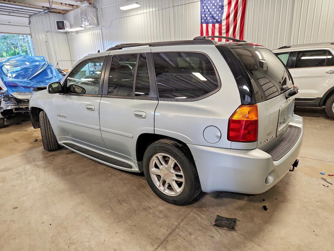 1GKET63M382115842 · 2008 GMC ENVOY · 2/14