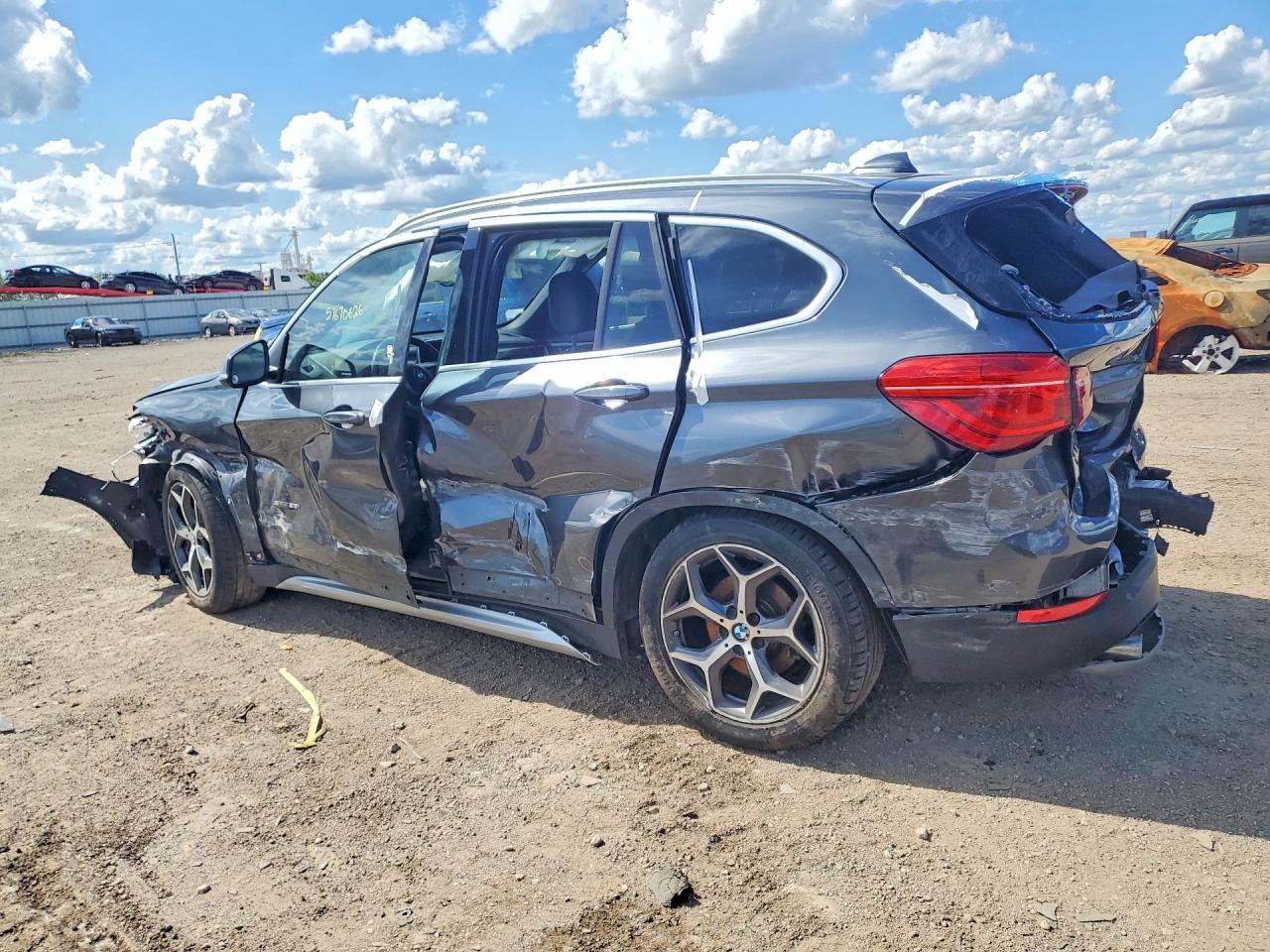 WBXHU7C39J5H42753 · 2018 BMW X1 · 2/13