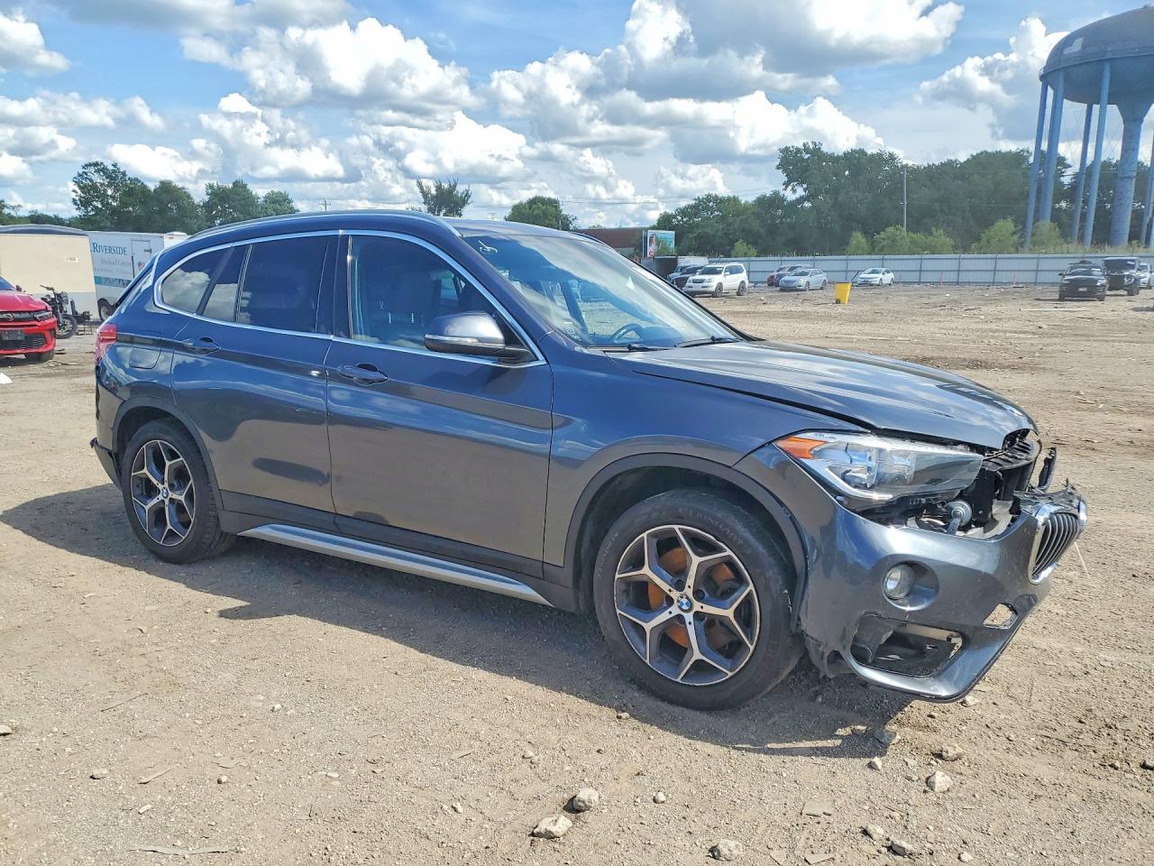 WBXHU7C39J5H42753 · 2018 BMW X1 · 4/13