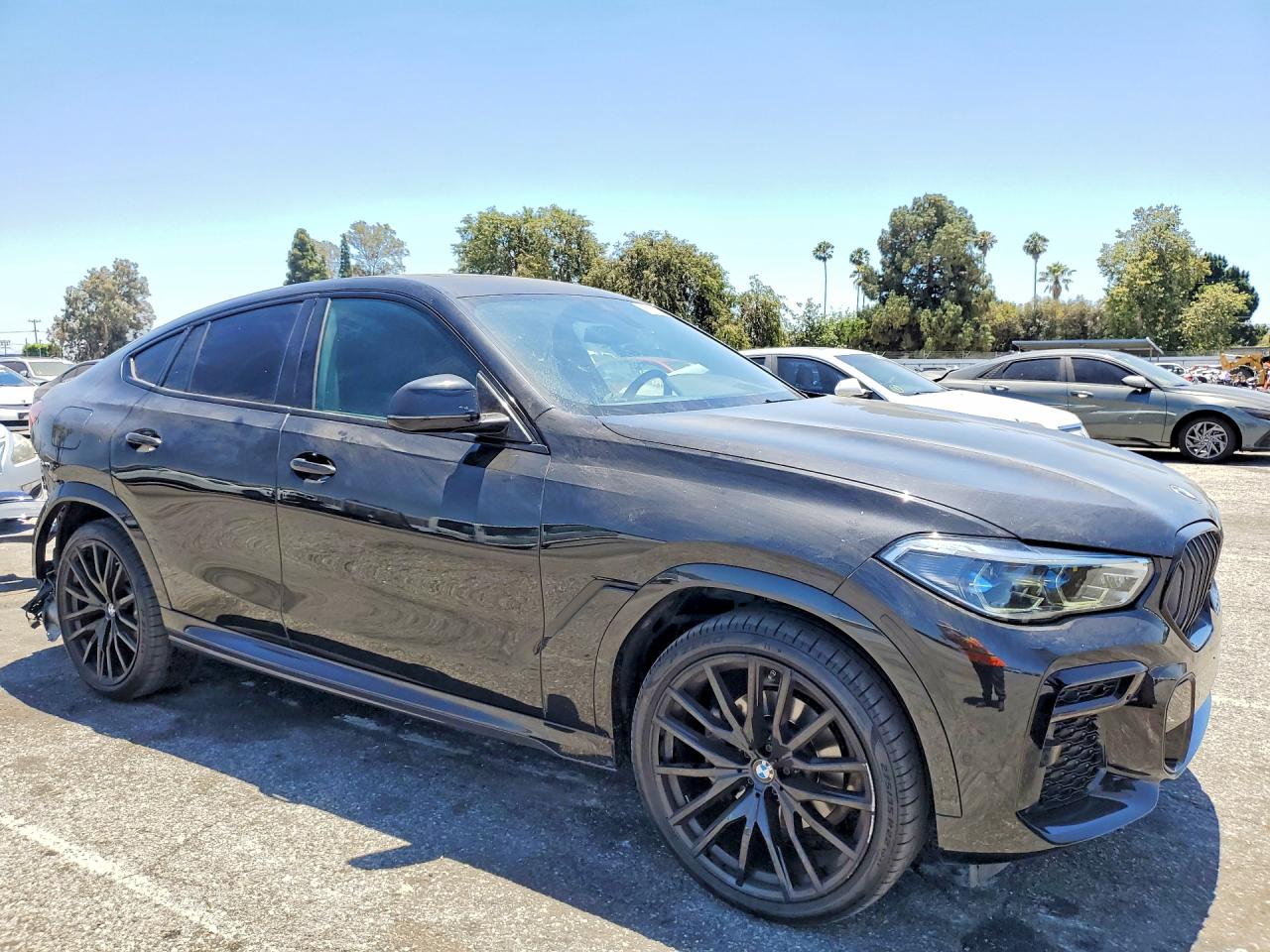 5UXCY6C0XN9L15796 · 2022 BMW X6 · 4/13