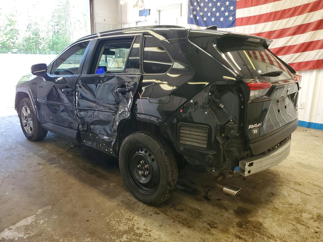 JTMRWRFV4PD196606 · 2023 TOYOTA RAV4 HYBRID · 2/12