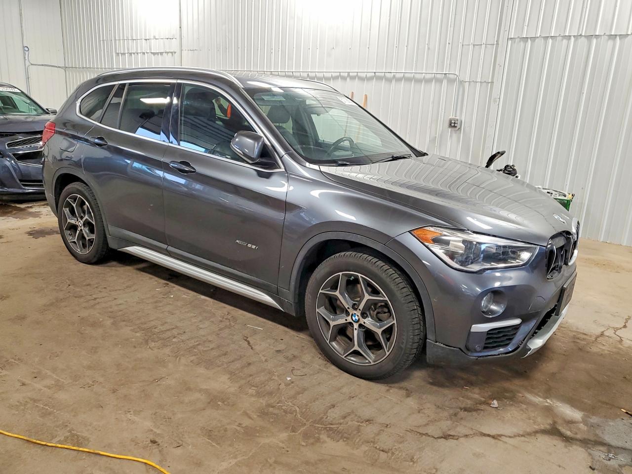 WBXHT3C36G5E53687 · 2016 BMW X1 · 4/13