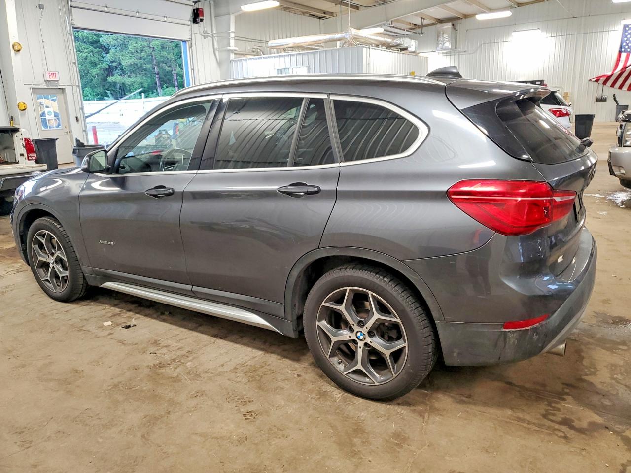 WBXHT3C36G5E53687 · 2016 BMW X1 · 2/13