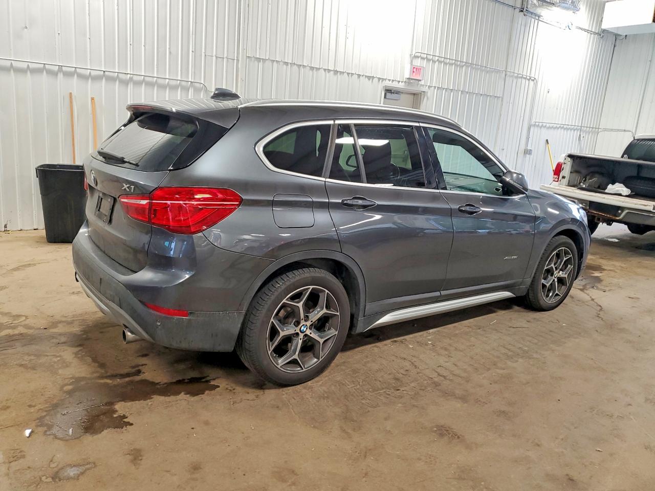 WBXHT3C36G5E53687 · 2016 BMW X1 · 3/13