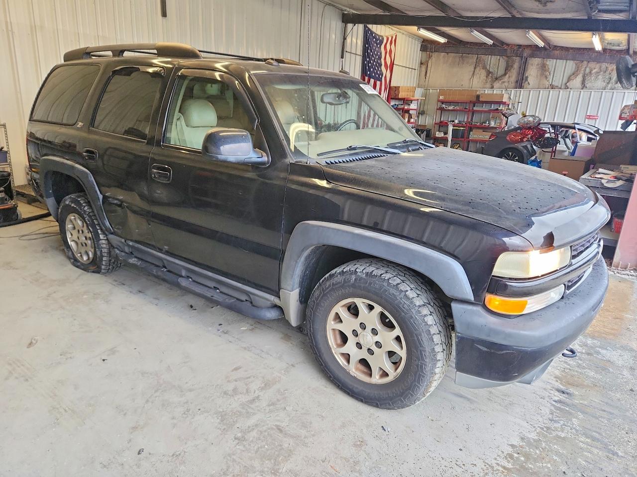 1GNEK13Z83R176690 · 2003 CHEVROLET TAHOE · 4/13