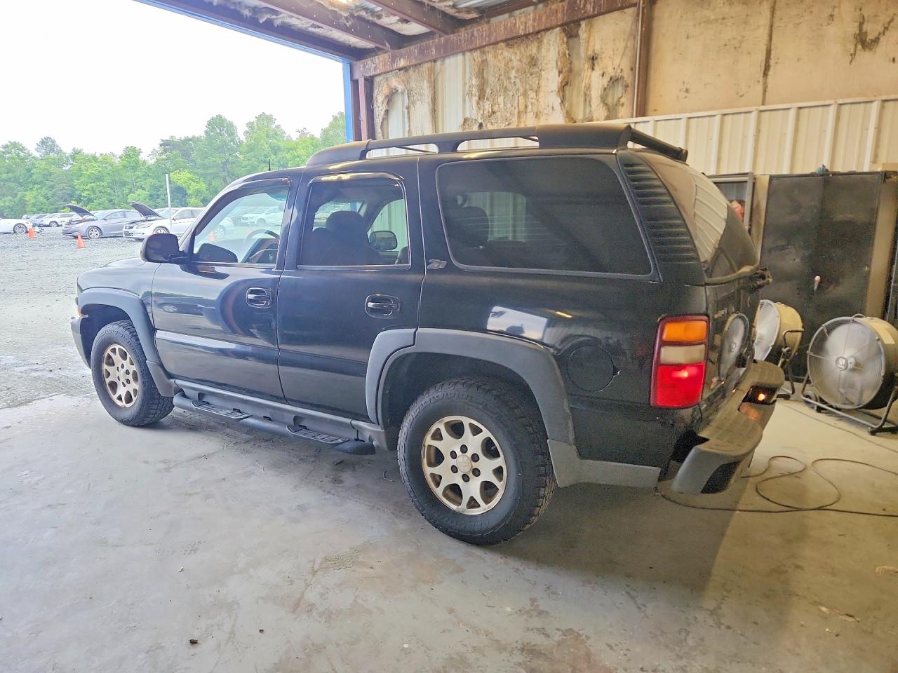 1GNEK13Z83R176690 · 2003 CHEVROLET TAHOE · 2/13