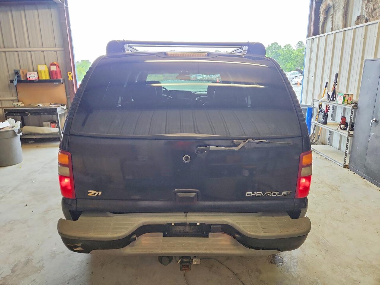 1GNEK13Z83R176690 · 2003 CHEVROLET TAHOE · 6/13