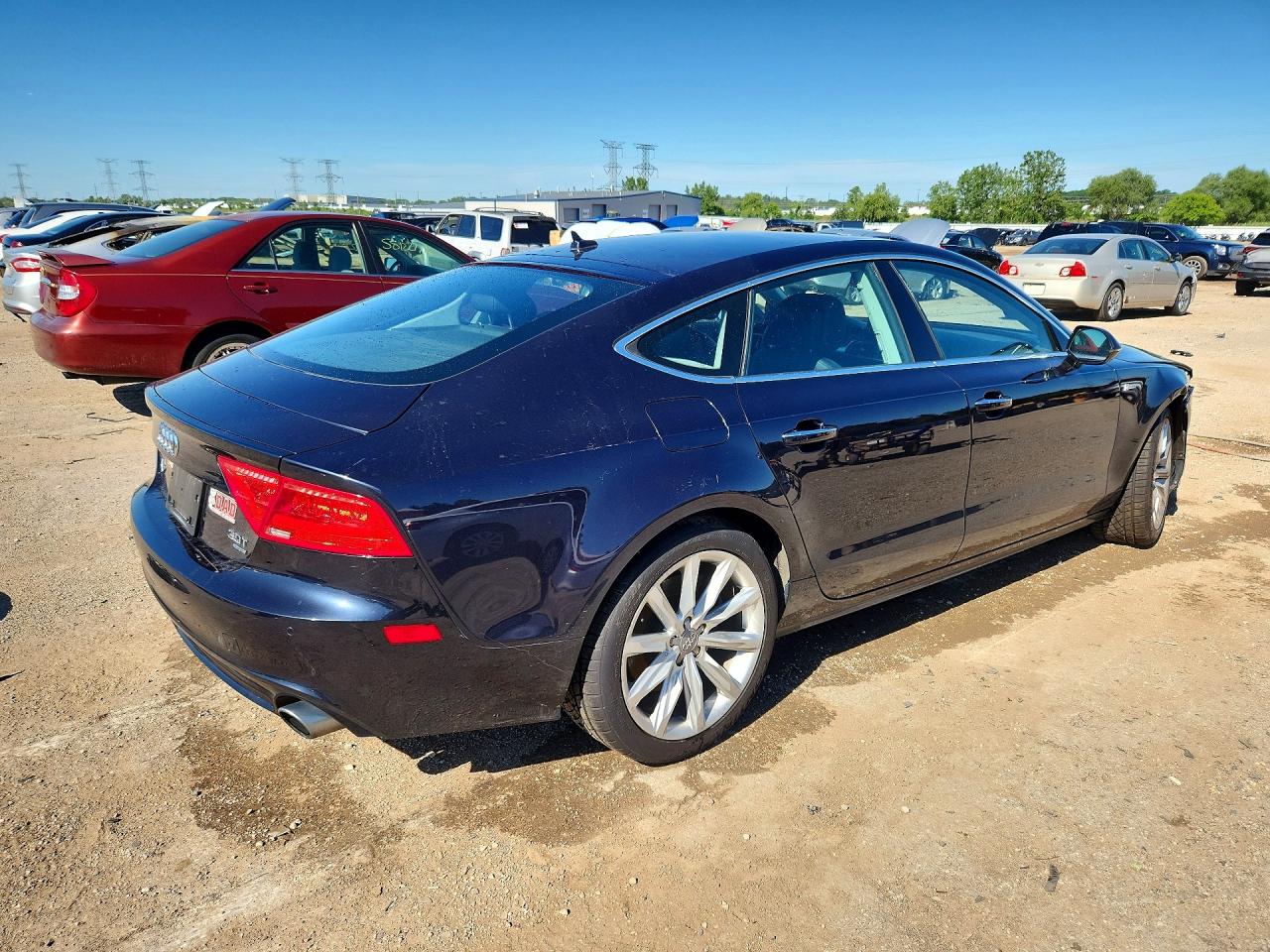 WAUWGAFCXFN004157 · 2015 AUDI A7 · 3/12