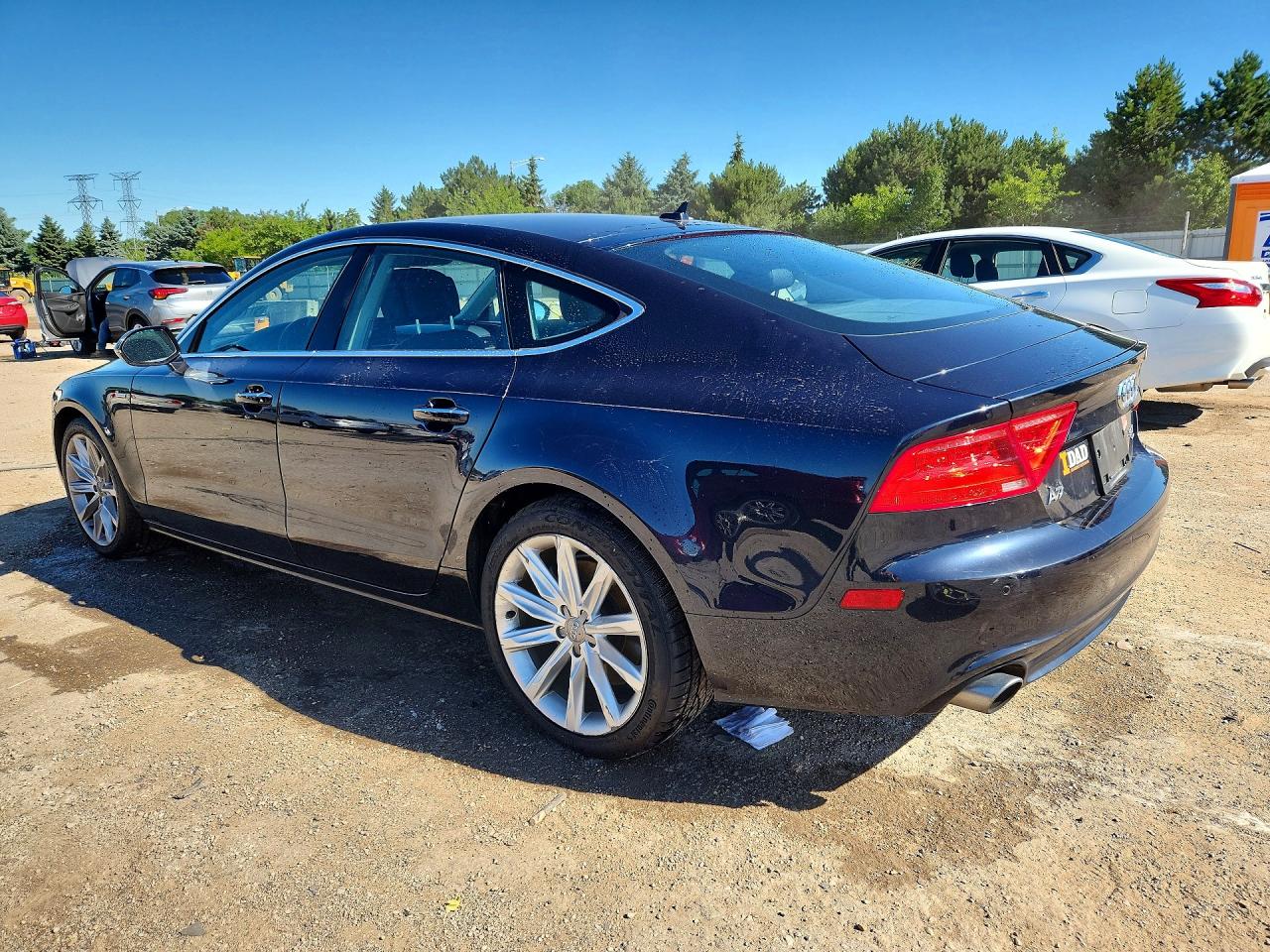 WAUWGAFCXFN004157 · 2015 AUDI A7 · 2/12