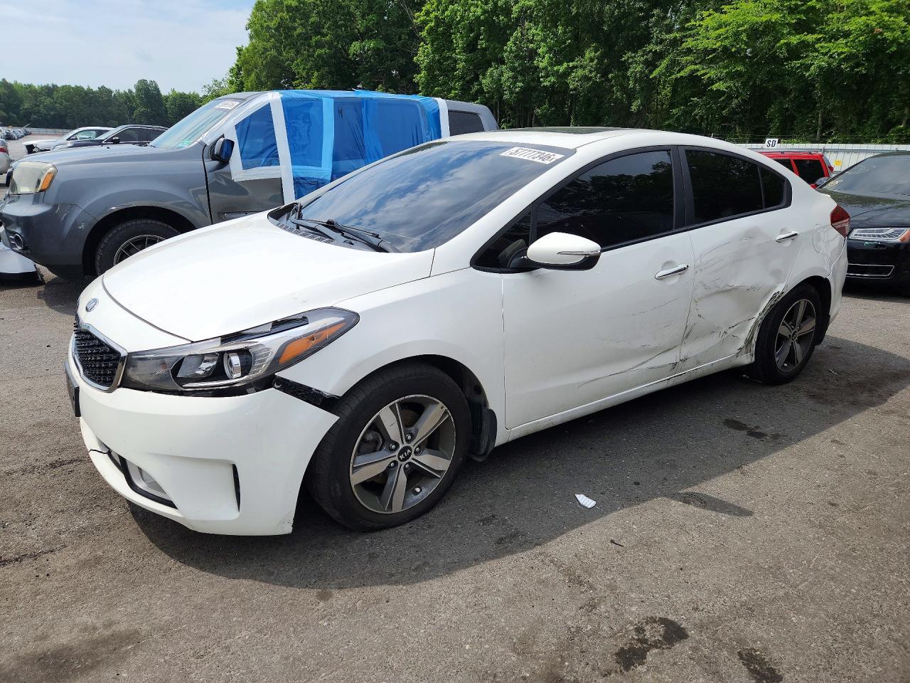 3KPFL4A70JE214676 · 2018 KIA FORTE