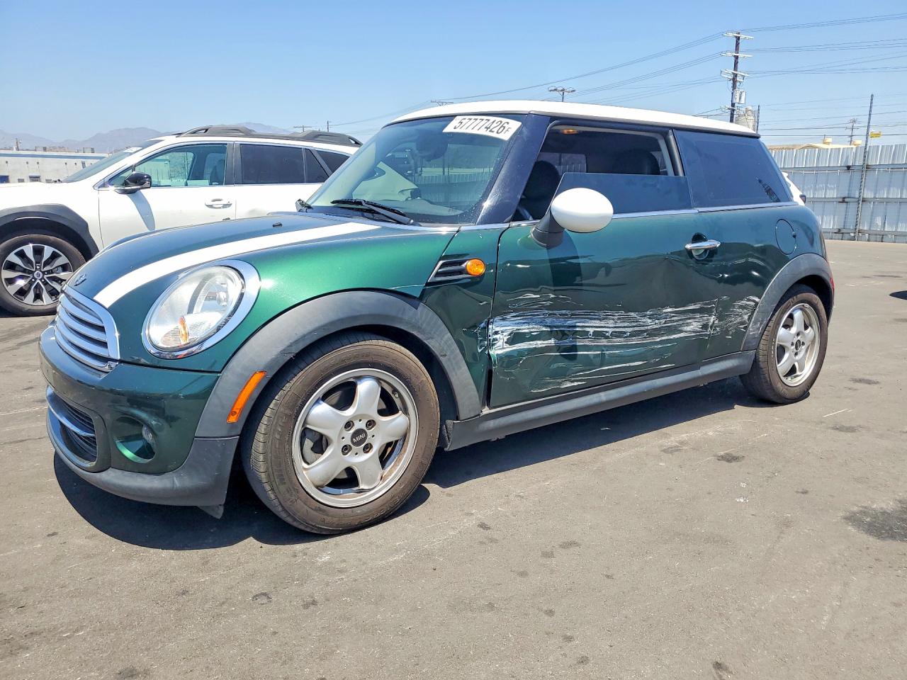 WMWSU3C50BT095129 · 2011 MINI COOPER