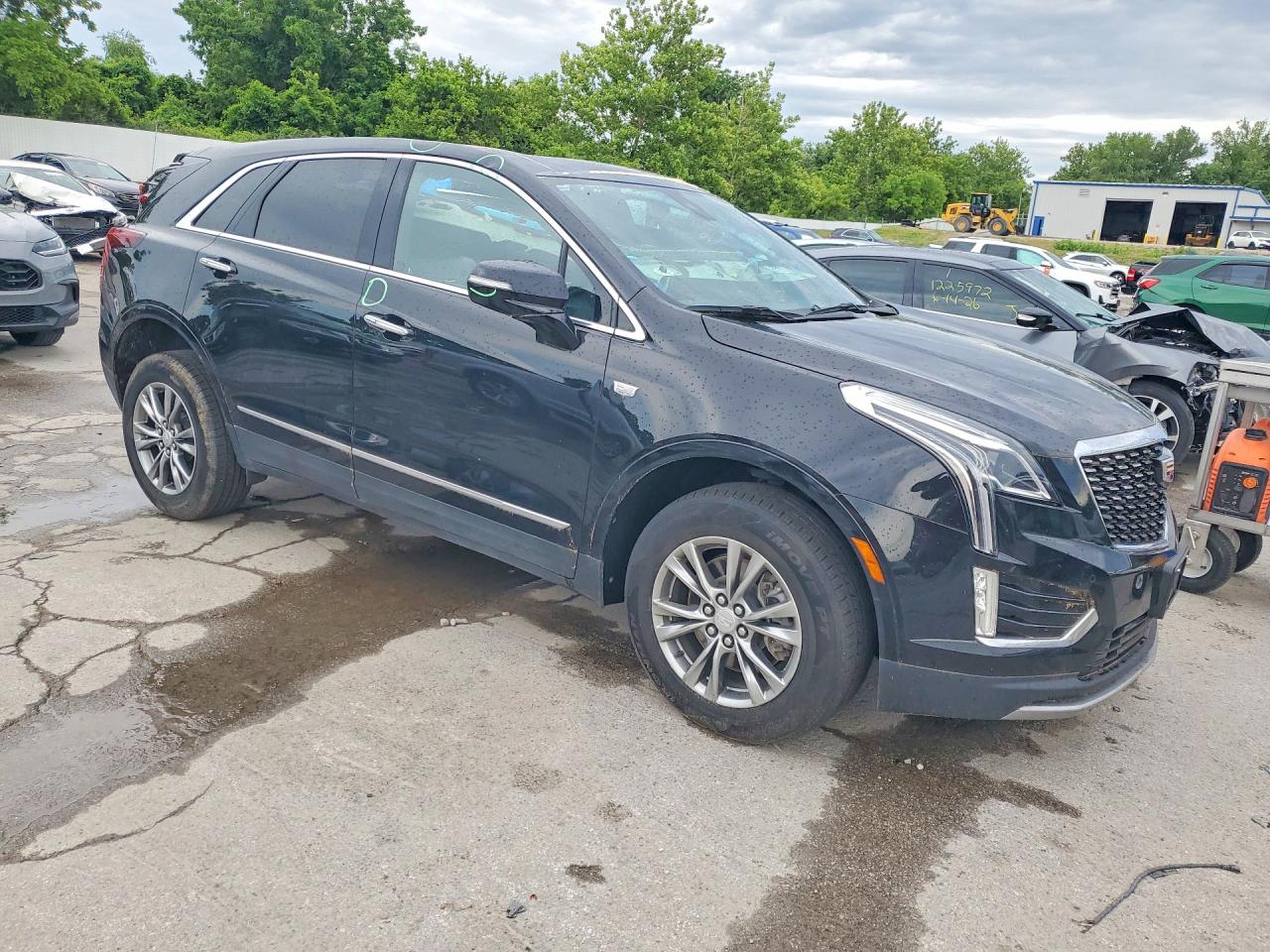 1GYKNCRS4PZ140522 · 2023 CADILLAC XT5 · 4/13