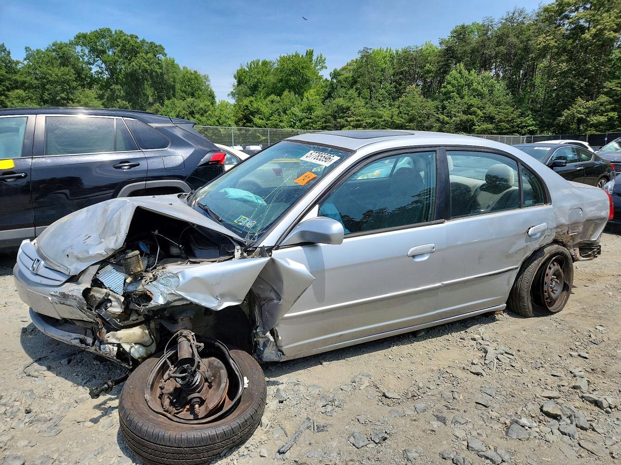 2HGES26843H586857 · 2003 HONDA CIVIC