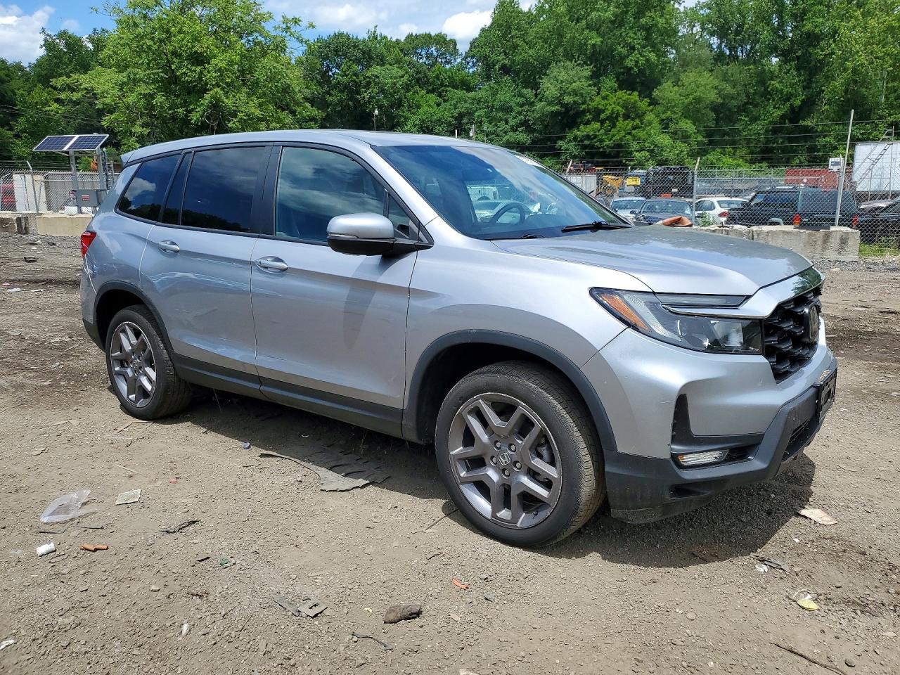 5FNYF8H55PB034950 · 2023 HONDA PASSPORT · 4/12