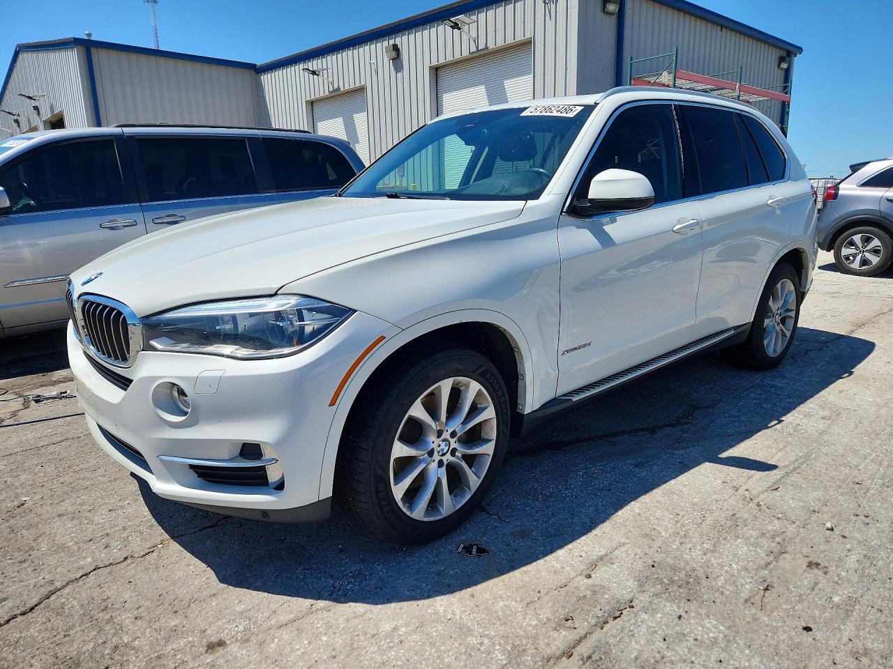 5UXKS4C56E0J95027 · 2014 BMW X5