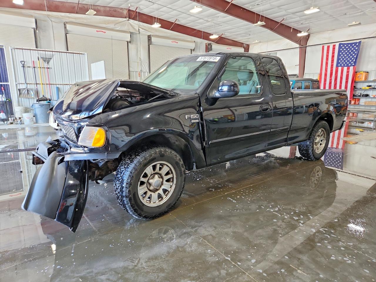 2FTRX17WX2CA87078 · 2002 FORD F150