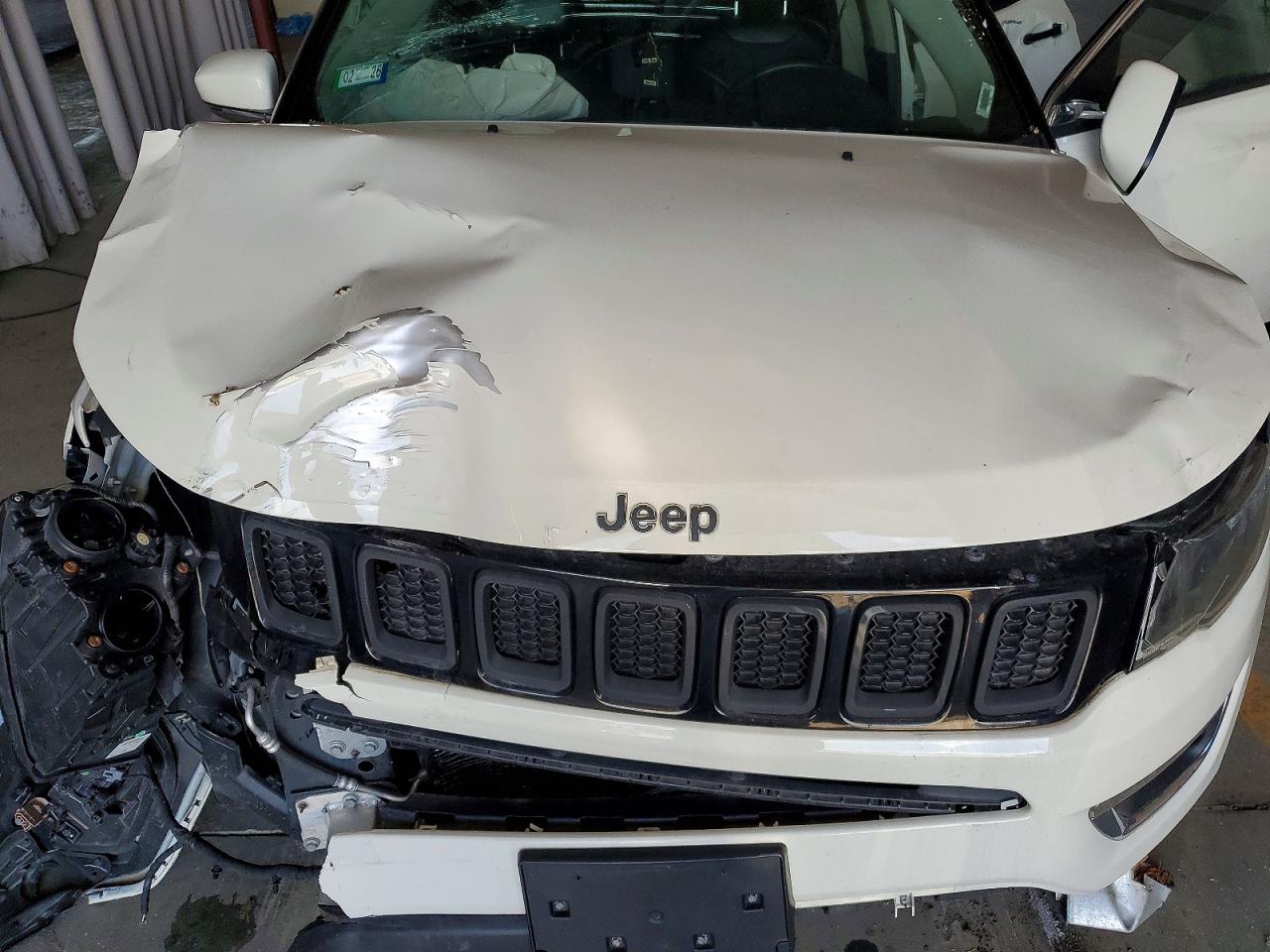 3C4NJDCB9JT209569 · 2018 JEEP COMPASS · 12/13