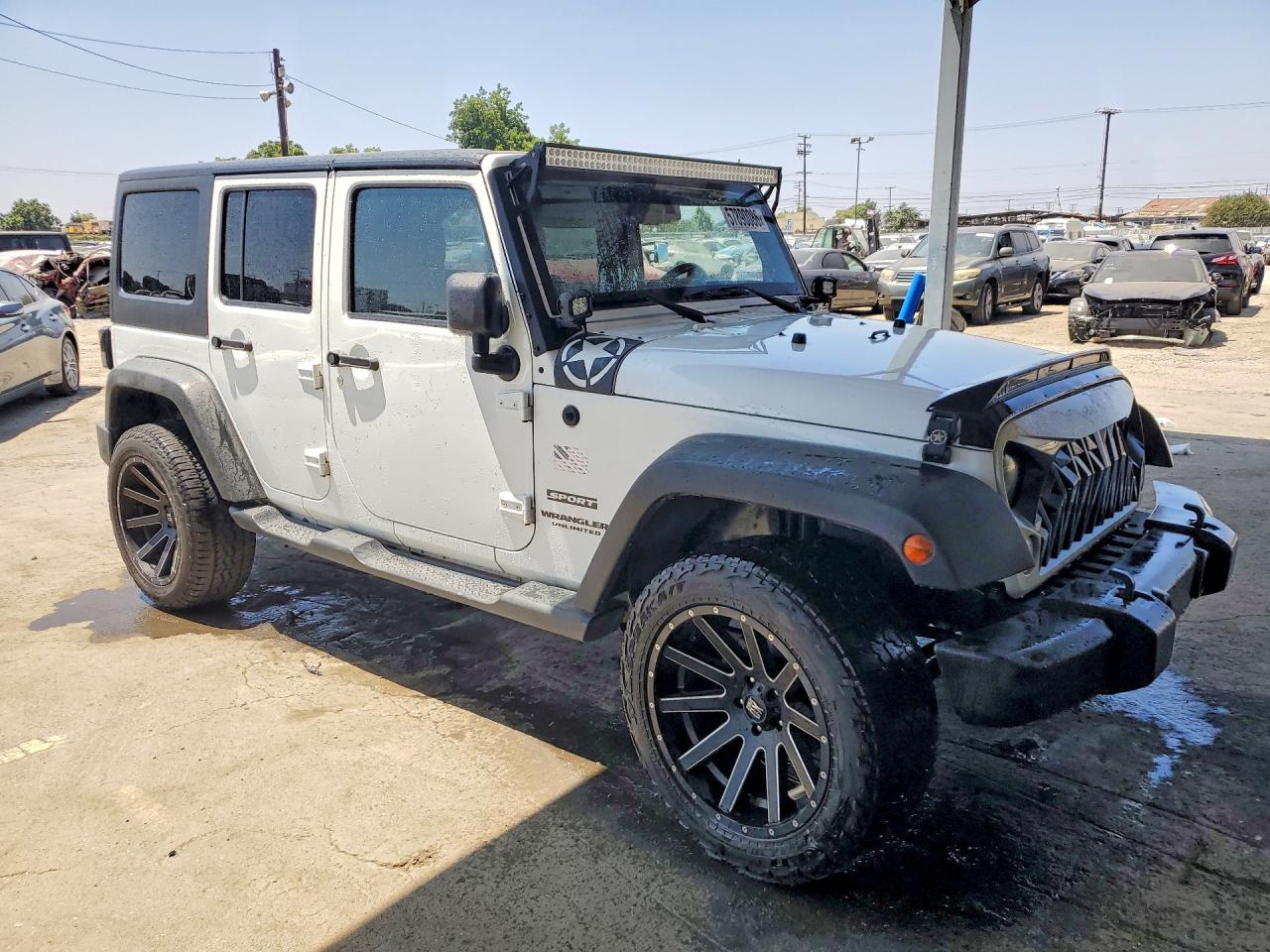 1C4BJWDG2EL251186 · 2014 JEEP WRANGLER UNLIMITED · 4/13