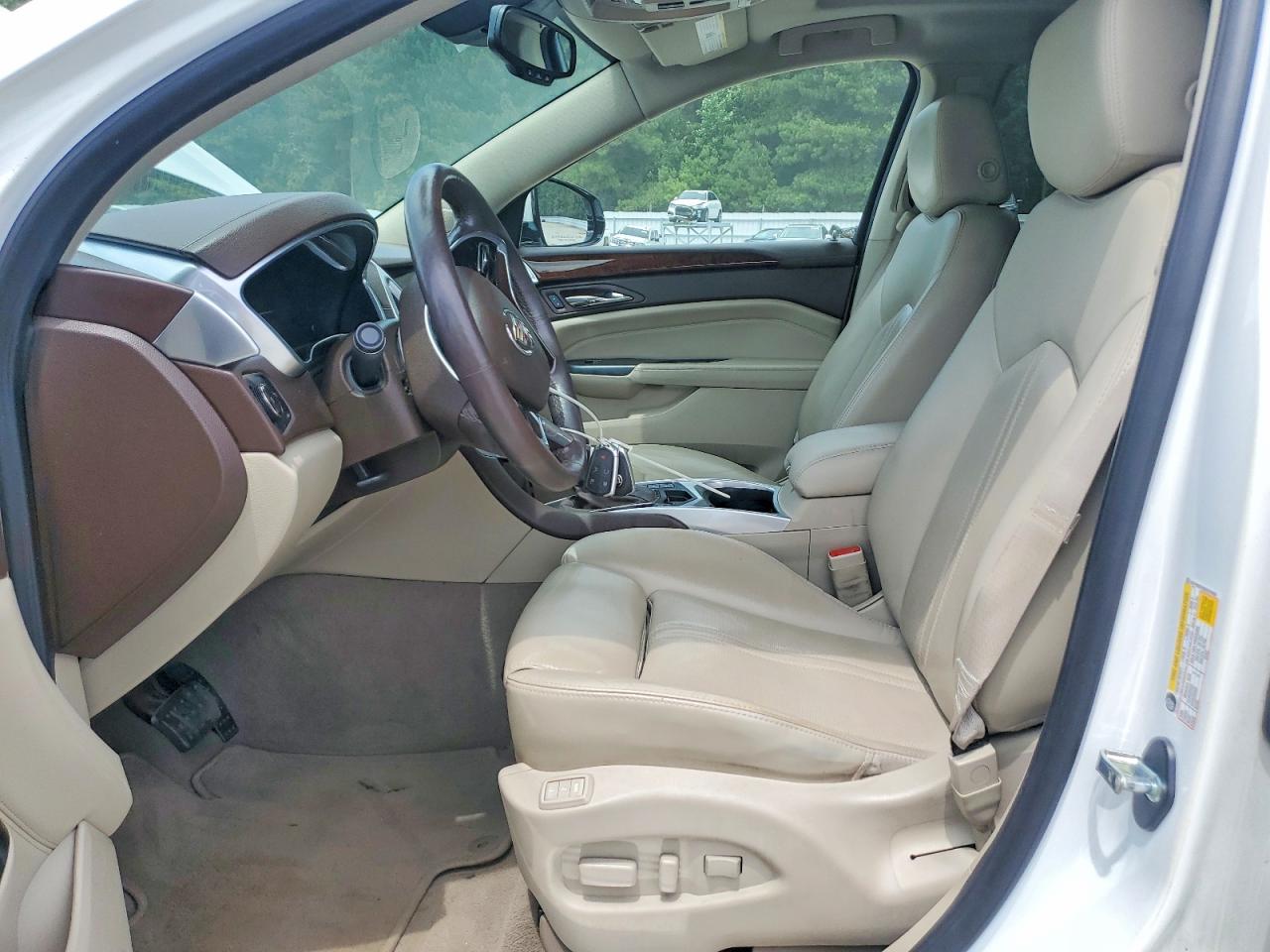 3GYFNDE33GS570495 · 2016 CADILLAC SRX · 7/12
