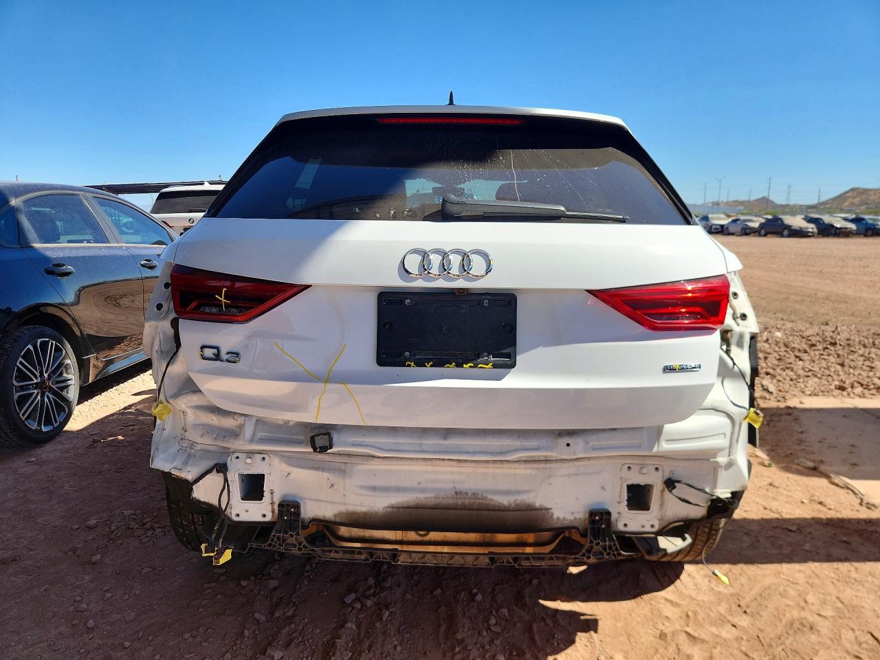 WA1DECF34P1135678 · 2023 AUDI Q3 · 6/14