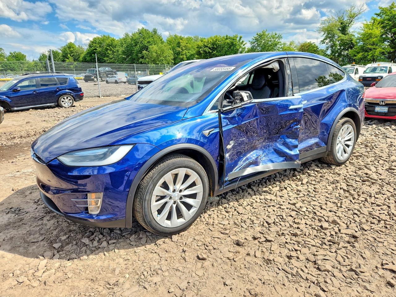5YJXCBE20HF057677 · 2017 TESLA MODEL X