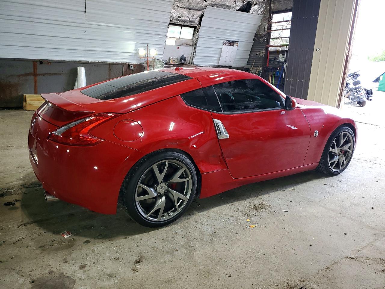 JN1AZ4EH7EM633307 · 2014 NISSAN 370Z · 3/12