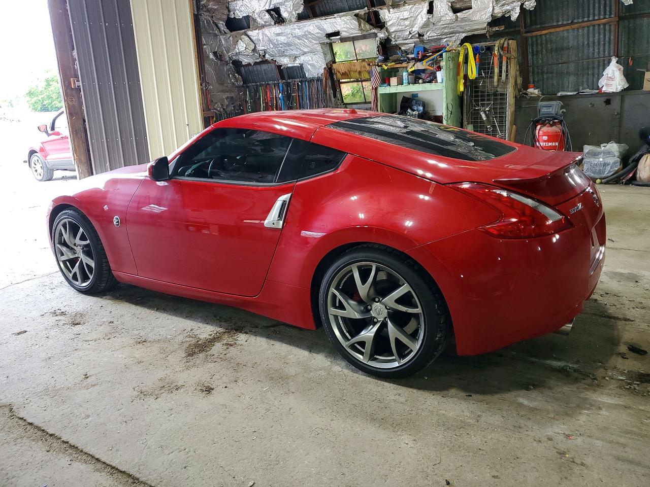 JN1AZ4EH7EM633307 · 2014 NISSAN 370Z · 2/12