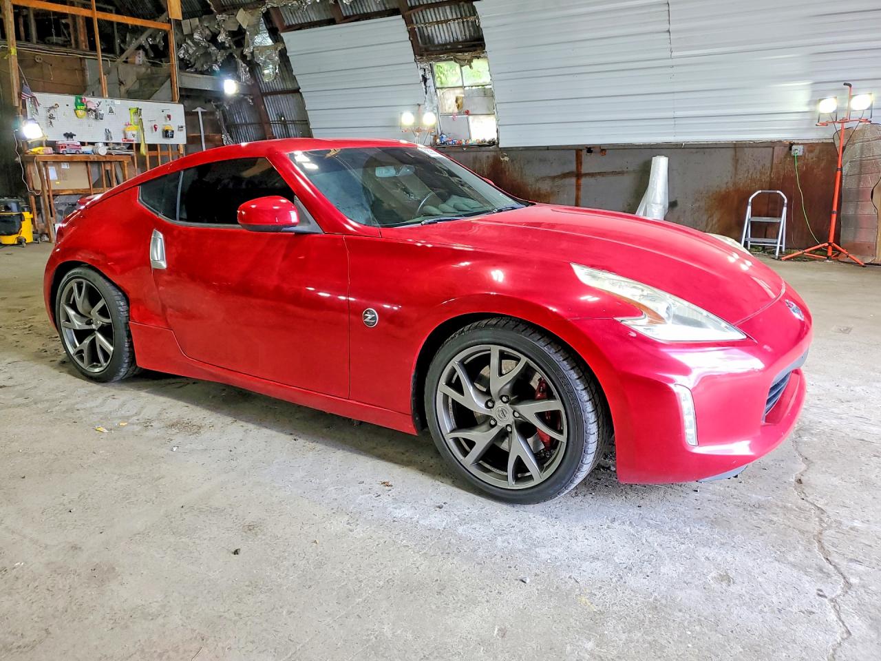 JN1AZ4EH7EM633307 · 2014 NISSAN 370Z · 4/12