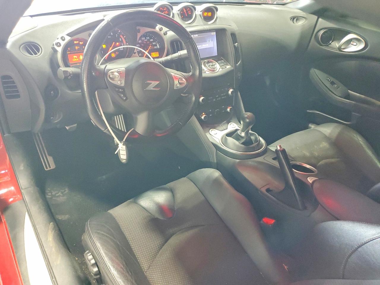 JN1AZ4EH7EM633307 · 2014 NISSAN 370Z · 8/12