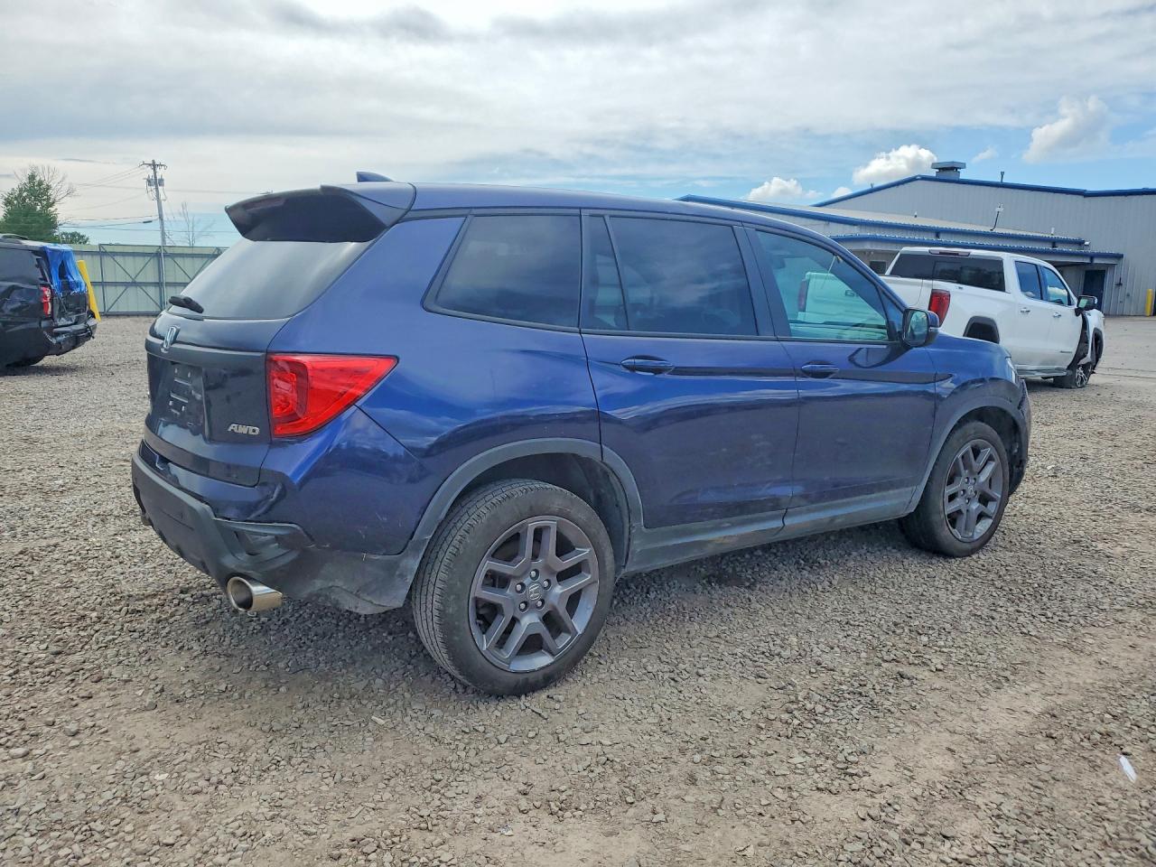 5FNYF8H5XPB043532 · 2023 HONDA PASSPORT · 3/13