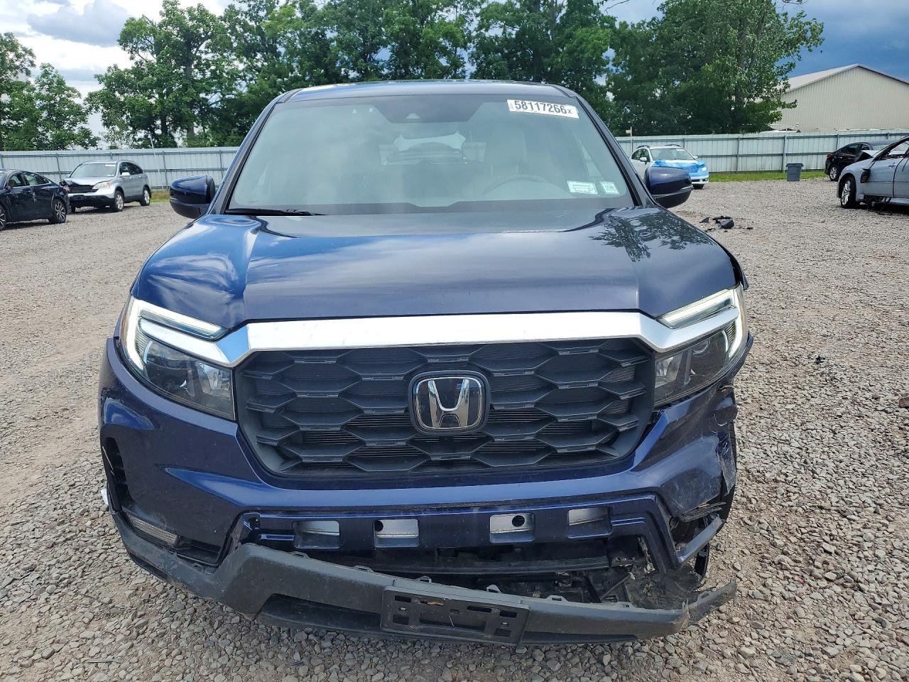 5FNYF8H5XPB043532 · 2023 HONDA PASSPORT · 5/13