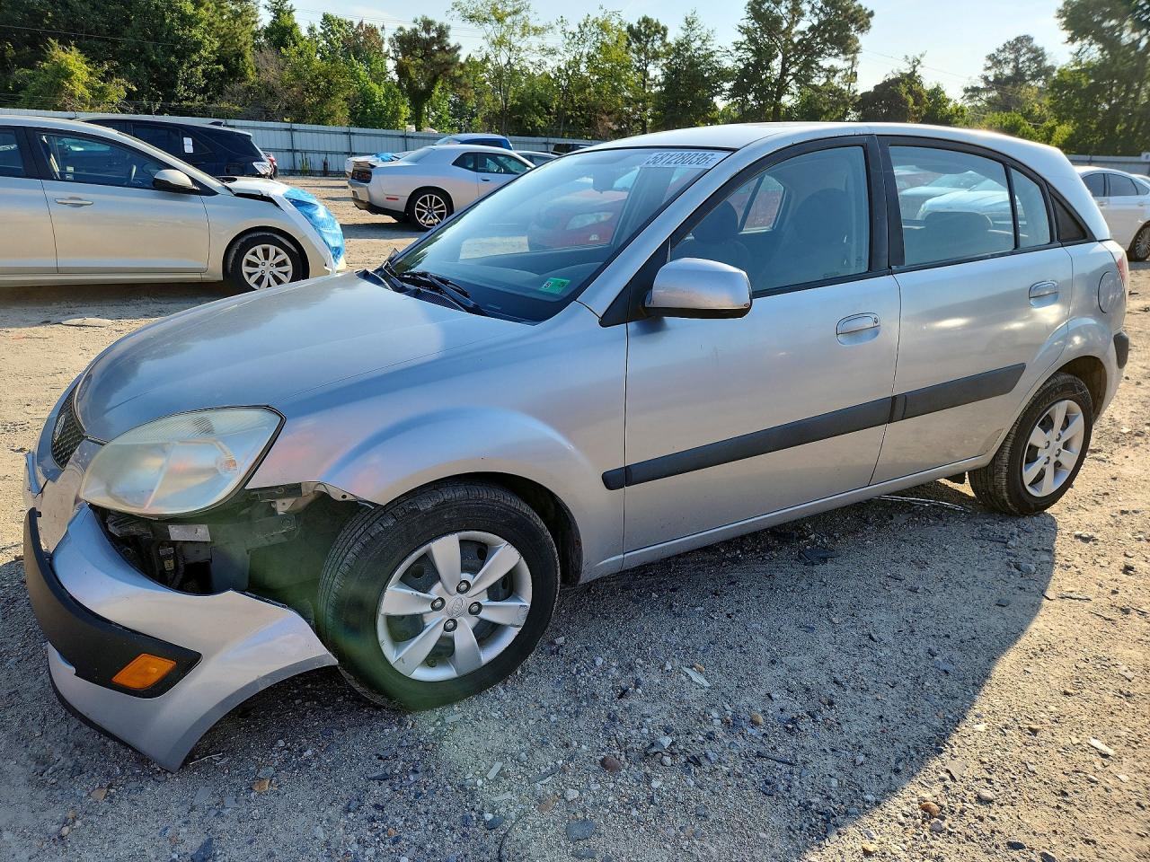 KNADE243396496700 · 2009 KIA RIO