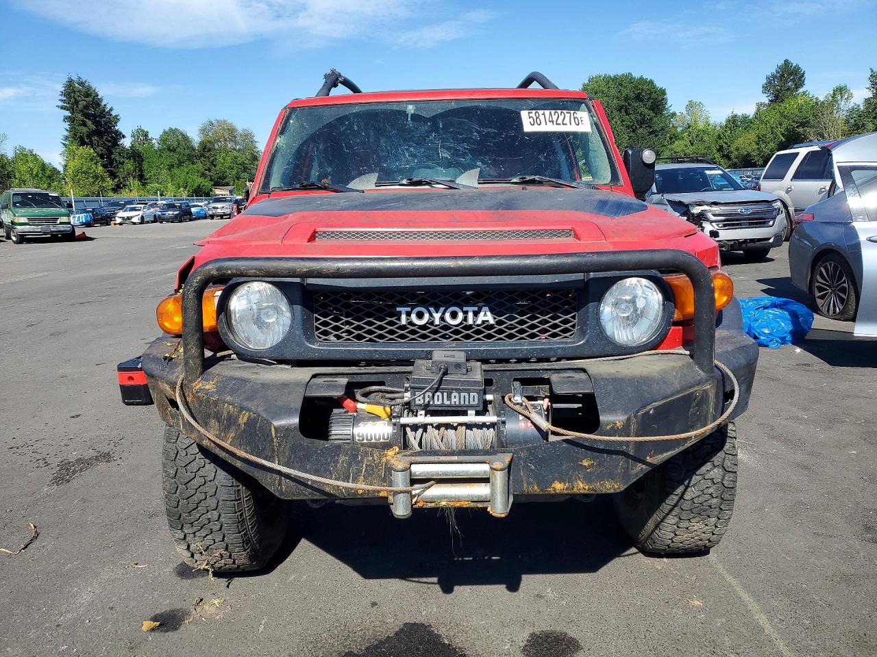 JTEBU4BF6CK128432 · 2012 TOYOTA FJ CRUISER · 5/13
