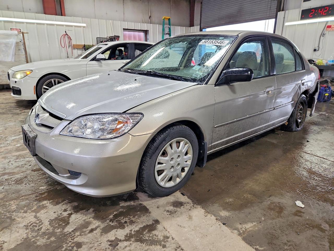 2HGES16564H636482 · 2004 HONDA CIVIC