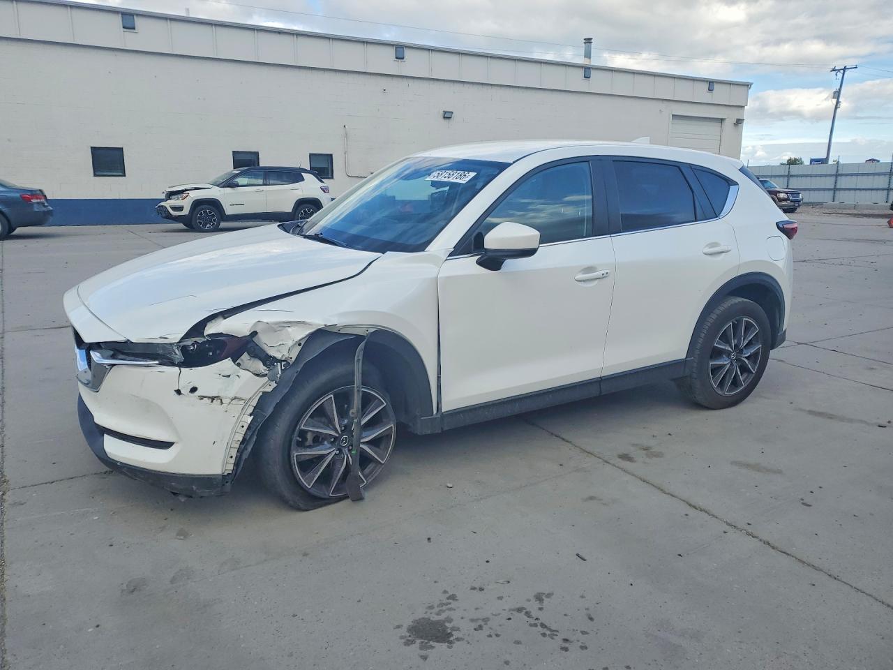 JM3KFBCM2J0403228 · 2018 MAZDA CX-5