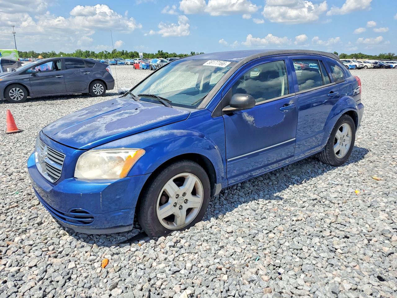 1B3HB48AX9D136063 · 2009 DODGE CALIBER