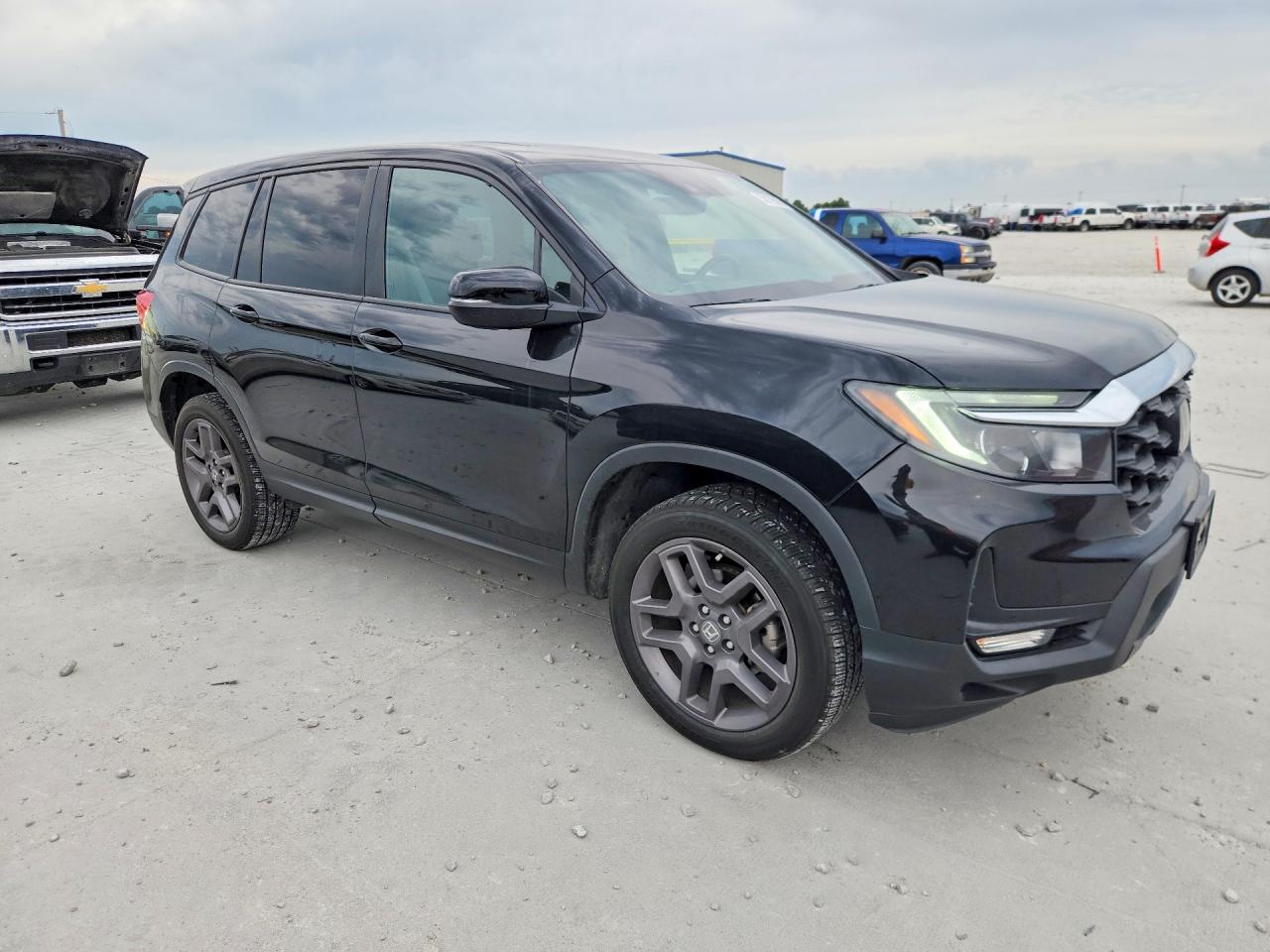 5FNYF8H52NB002759 · 2022 HONDA PASSPORT · 4/13