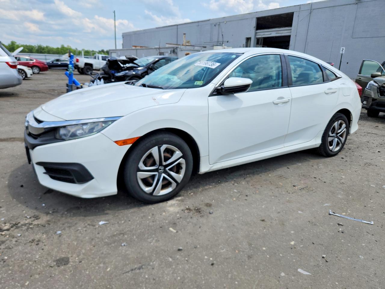 2HGFC2F59JH515206 · 2018 HONDA CIVIC