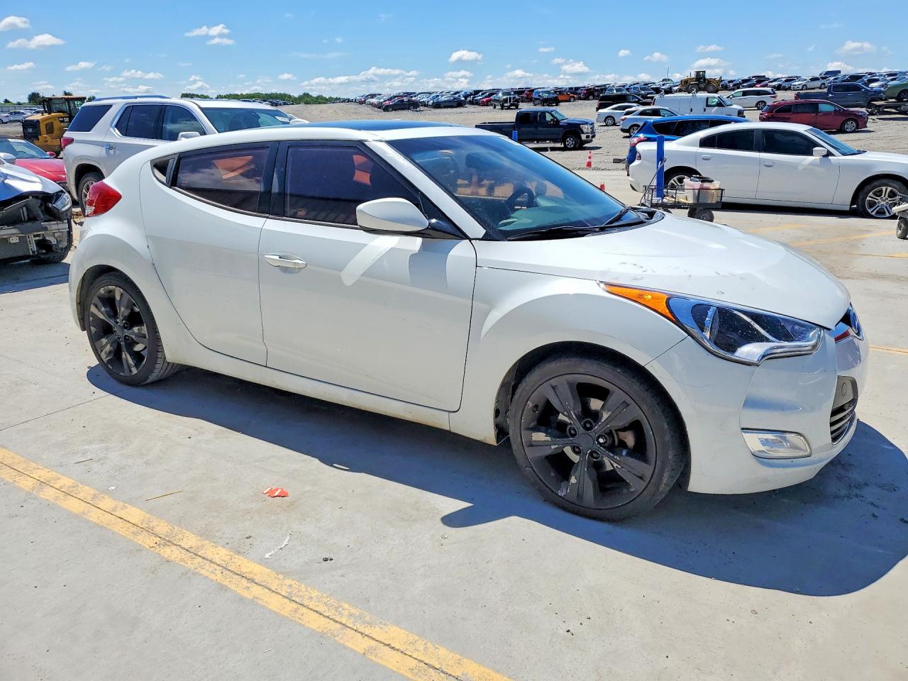 KMHTC6AD2GU300307 · 2016 HYUNDAI VELOSTER · 4/12