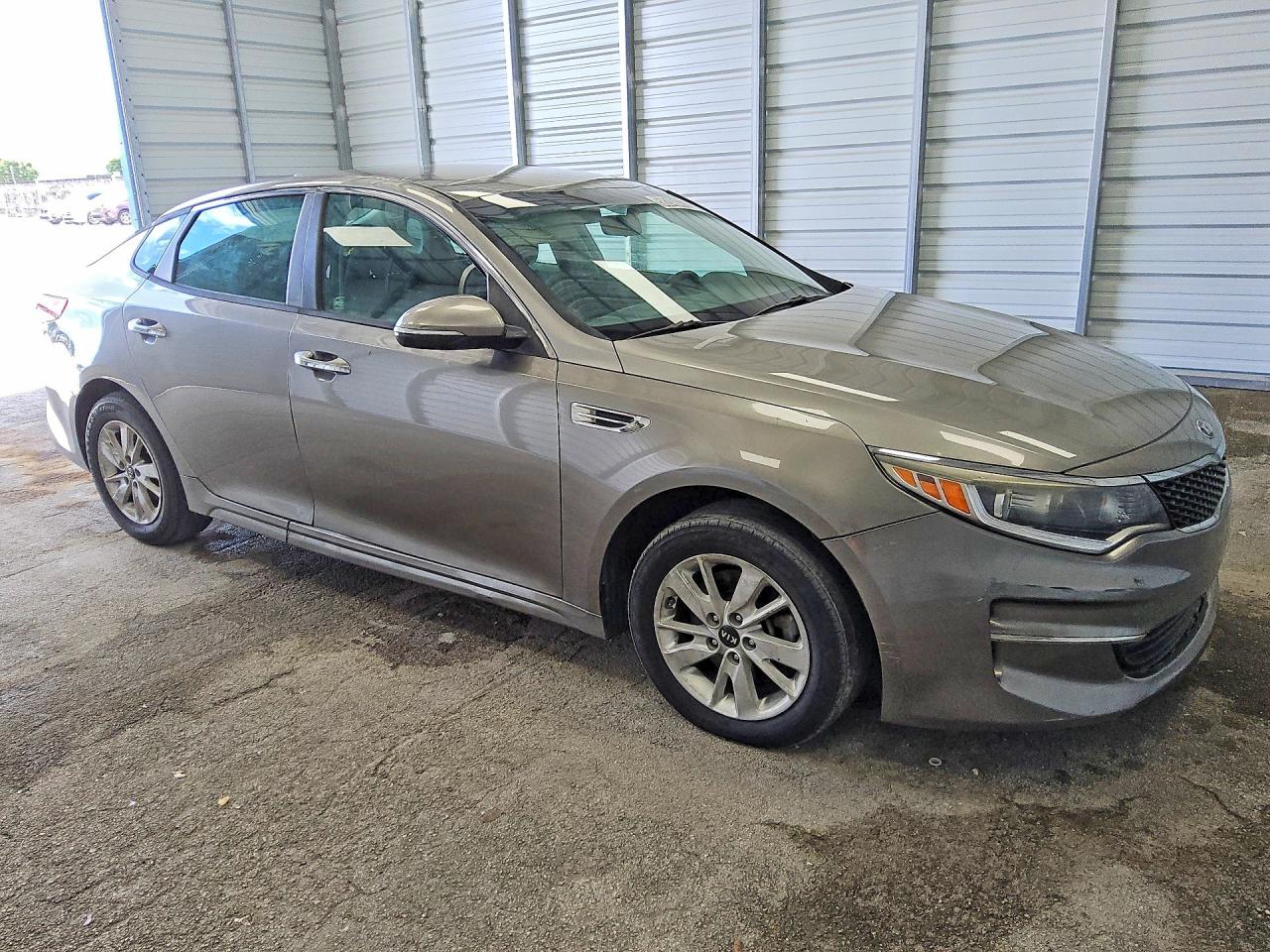 5XXGT4L36GG026243 · 2016 KIA OPTIMA · 4/12
