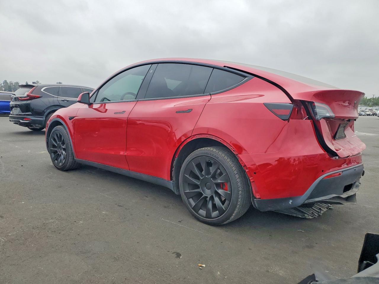 7SAYGAEEXNF561813 · 2022 TESLA MODEL Y · 2/14
