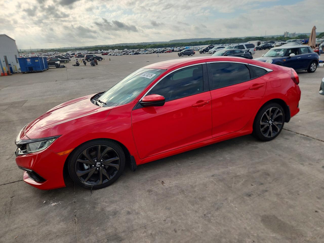 2HGFC2F8XMH556328 · 2021 HONDA CIVIC