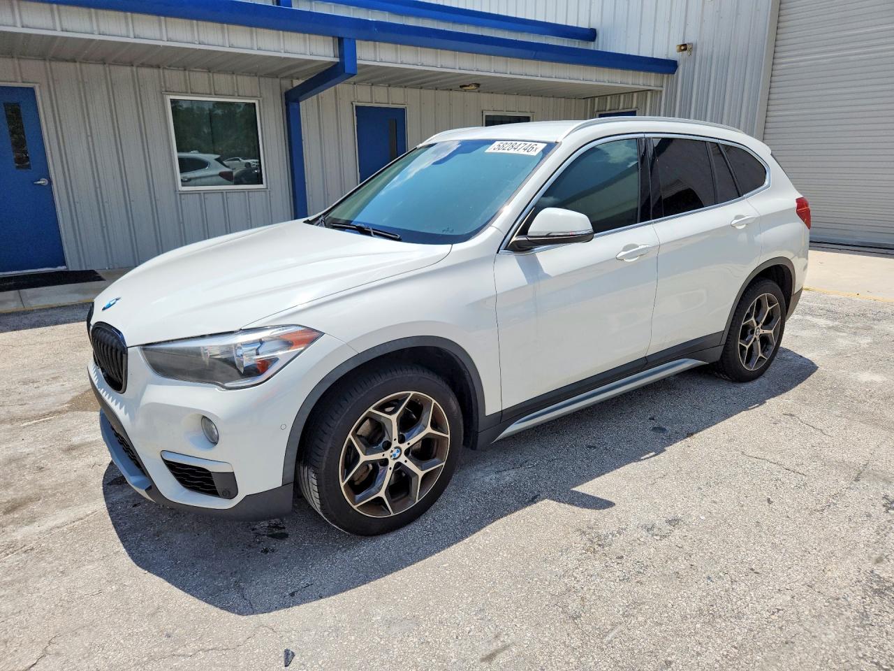 WBXHU7C33J5L06123 · 2018 BMW X1