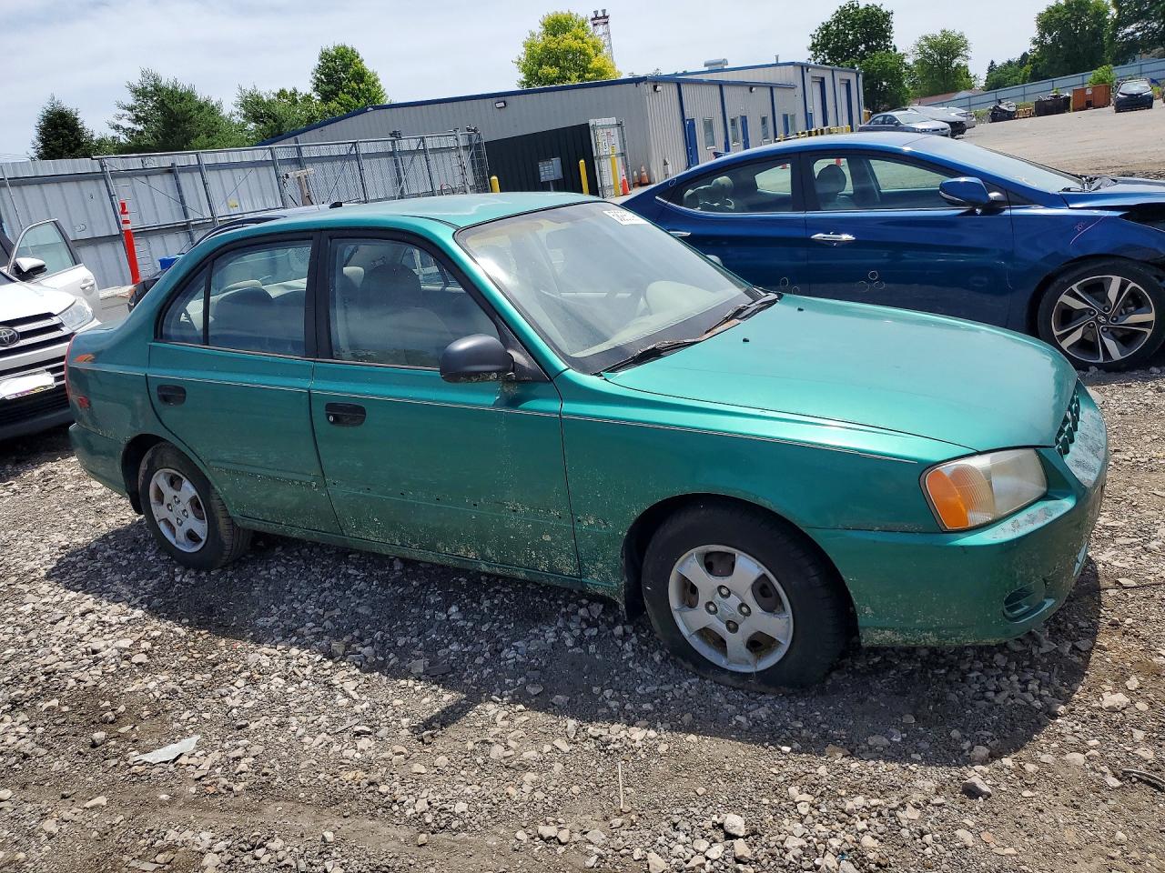 KMHCG45C91U169698 · 2001 HYUNDAI ACCENT · 4/12