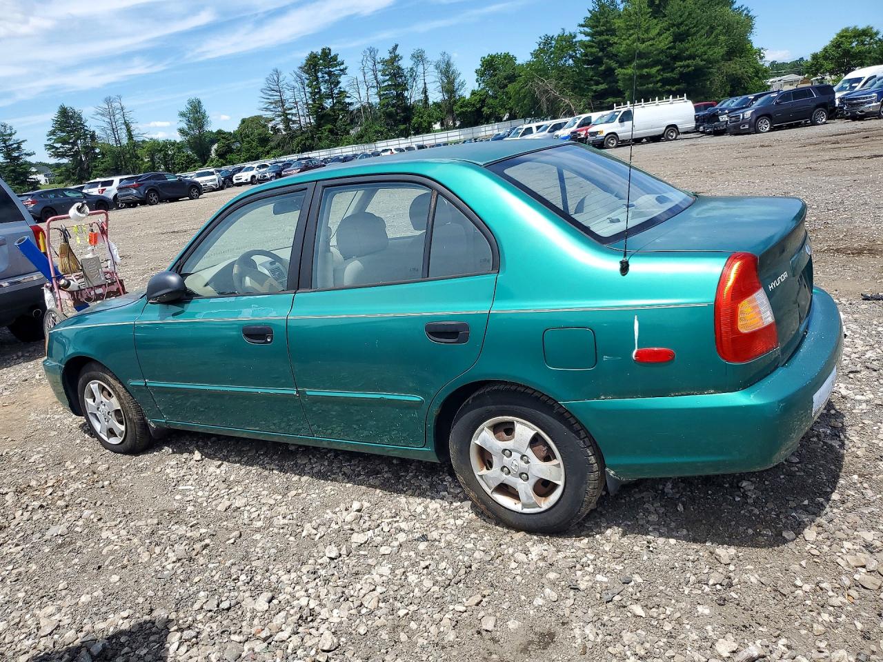 KMHCG45C91U169698 · 2001 HYUNDAI ACCENT · 2/12