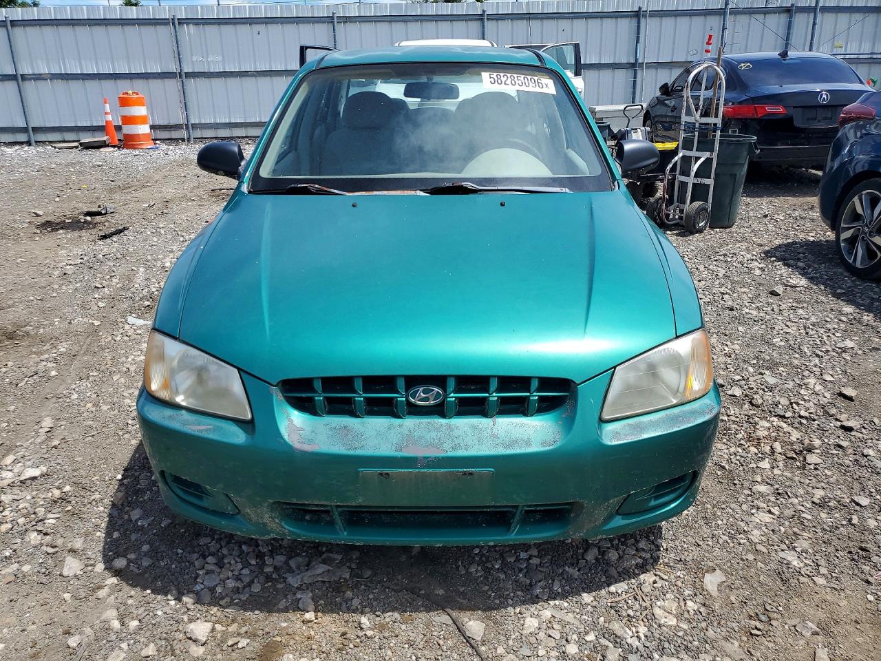 KMHCG45C91U169698 · 2001 HYUNDAI ACCENT · 5/12