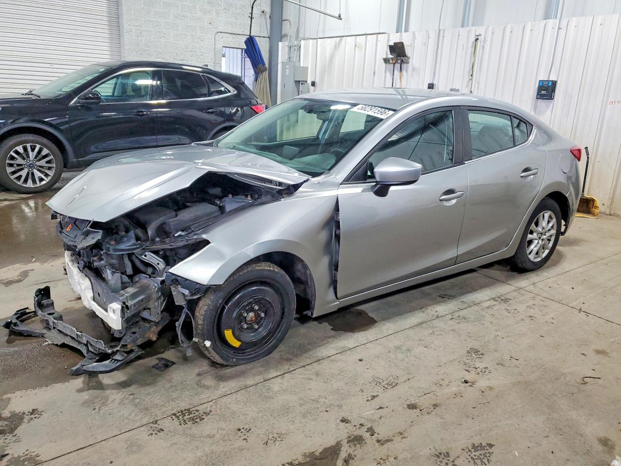 JM1BM1U75G1303807 · 2016 MAZDA 3