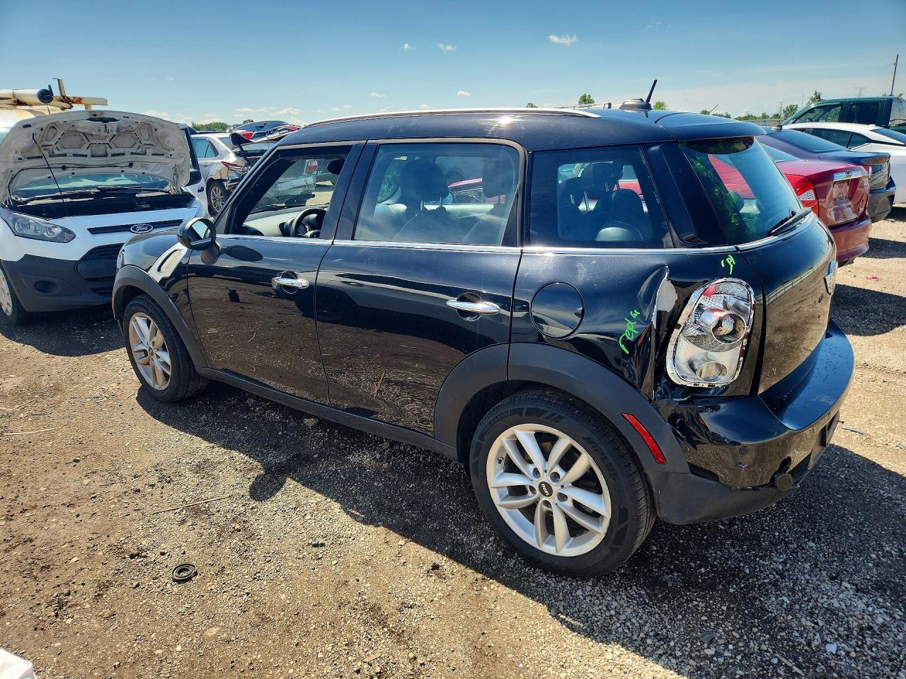 WMWZB3C51CWM05518 · 2012 MINI COOPER · 2/13