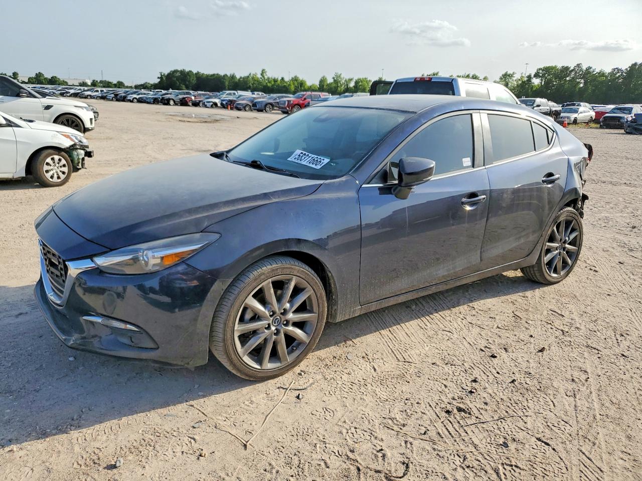 3MZBN1W3XJM251458 · 2018 MAZDA 3