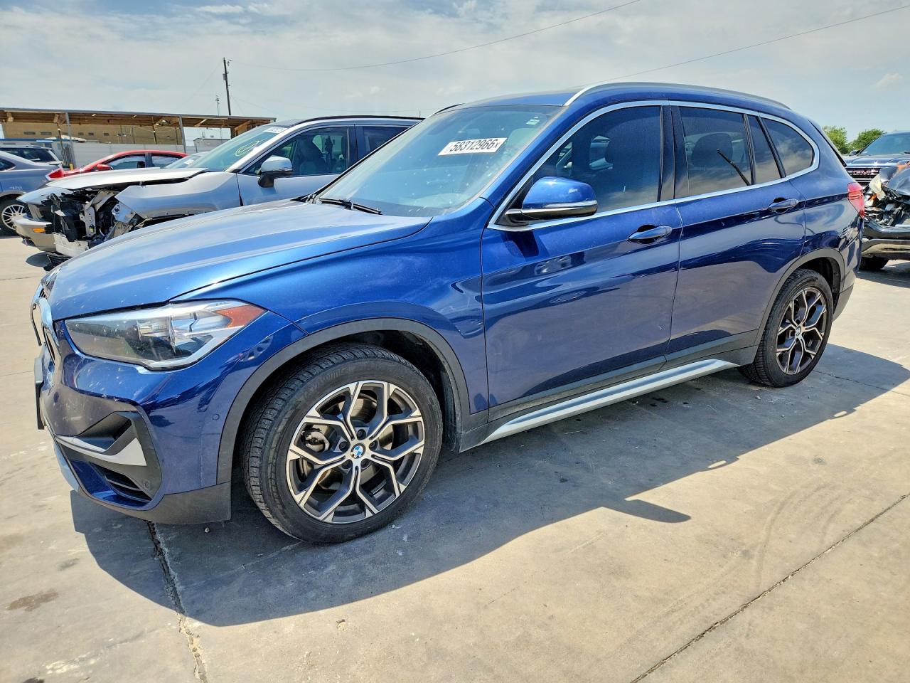WBXJG9C04M5T33040 · 2021 BMW X1